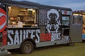 food truck with mean wolf an big words