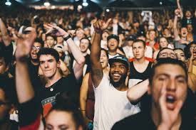 audience with man yelling in front row